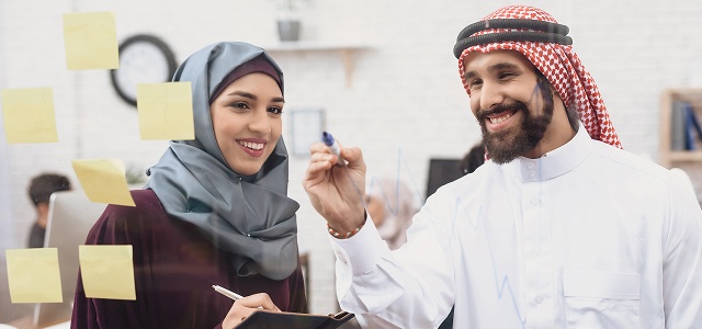 Professionals in office with positive engagement